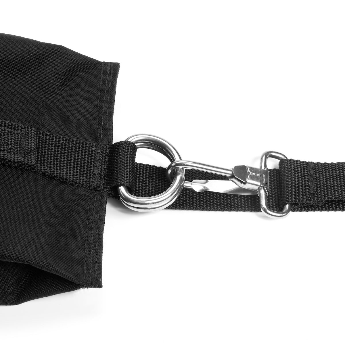 Close-up of a black strap with metal hardware on a white background