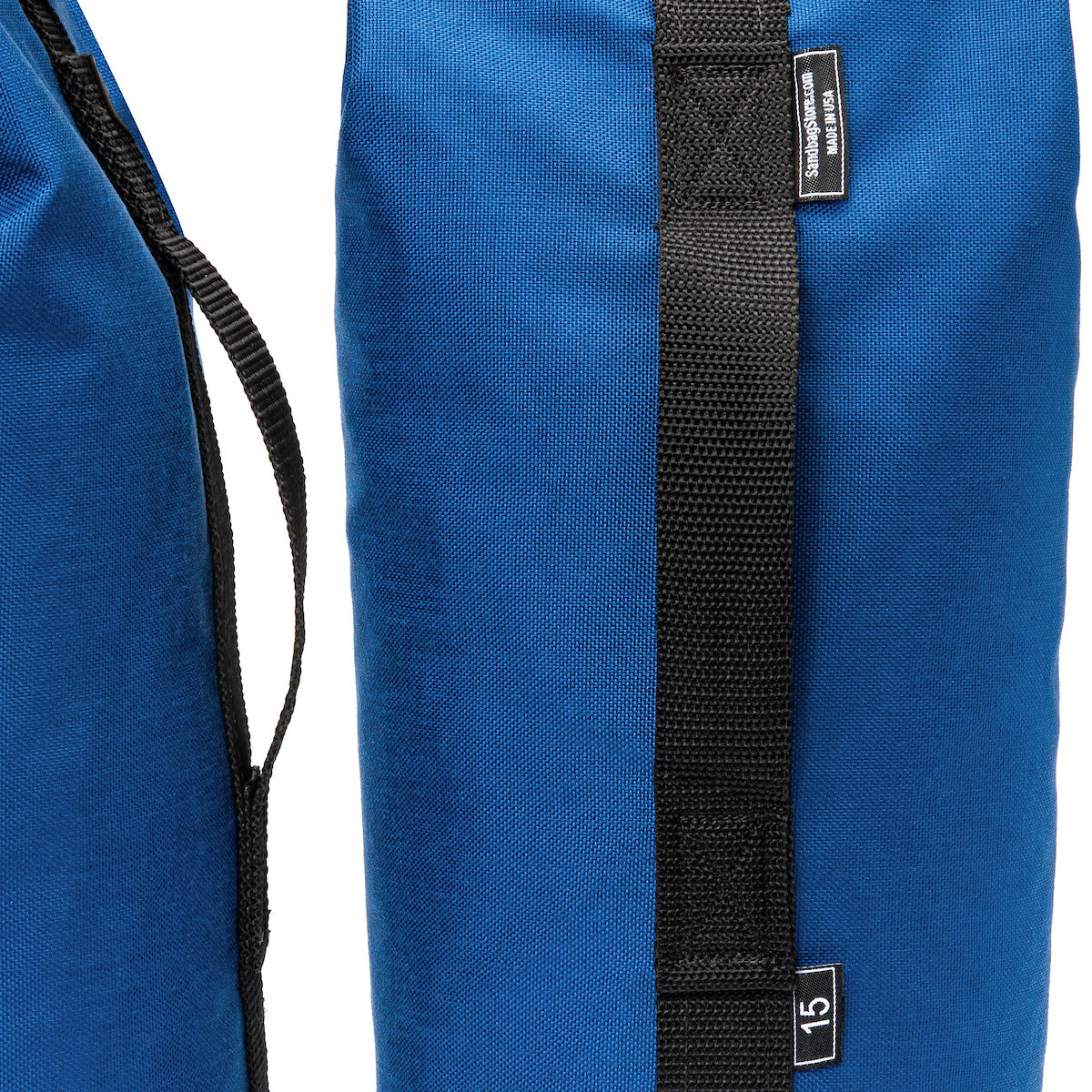 Blue bag with black strap and visible brand label on a white background