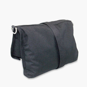Black butterfly sandbag with a strap on a white background
