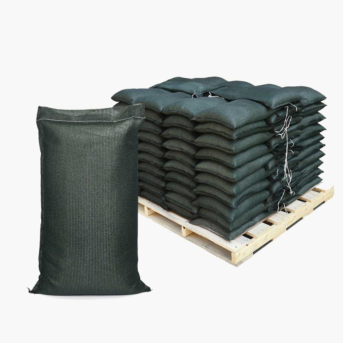 Stack of green durabag 5 year uv sandbags on a wooden pallet with a single sandbag in front on a white background